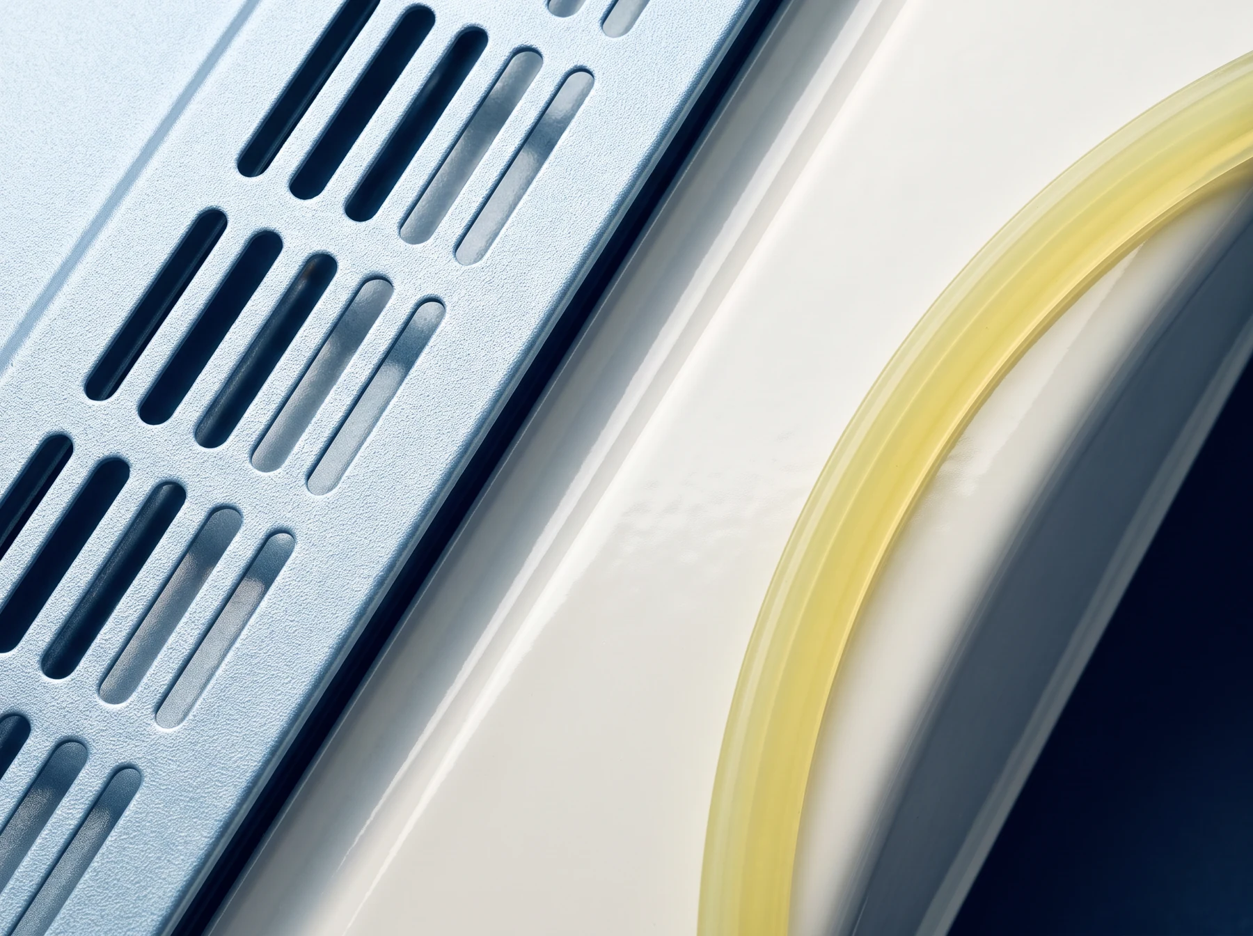 A close-up of a clean appliance ventilation grille